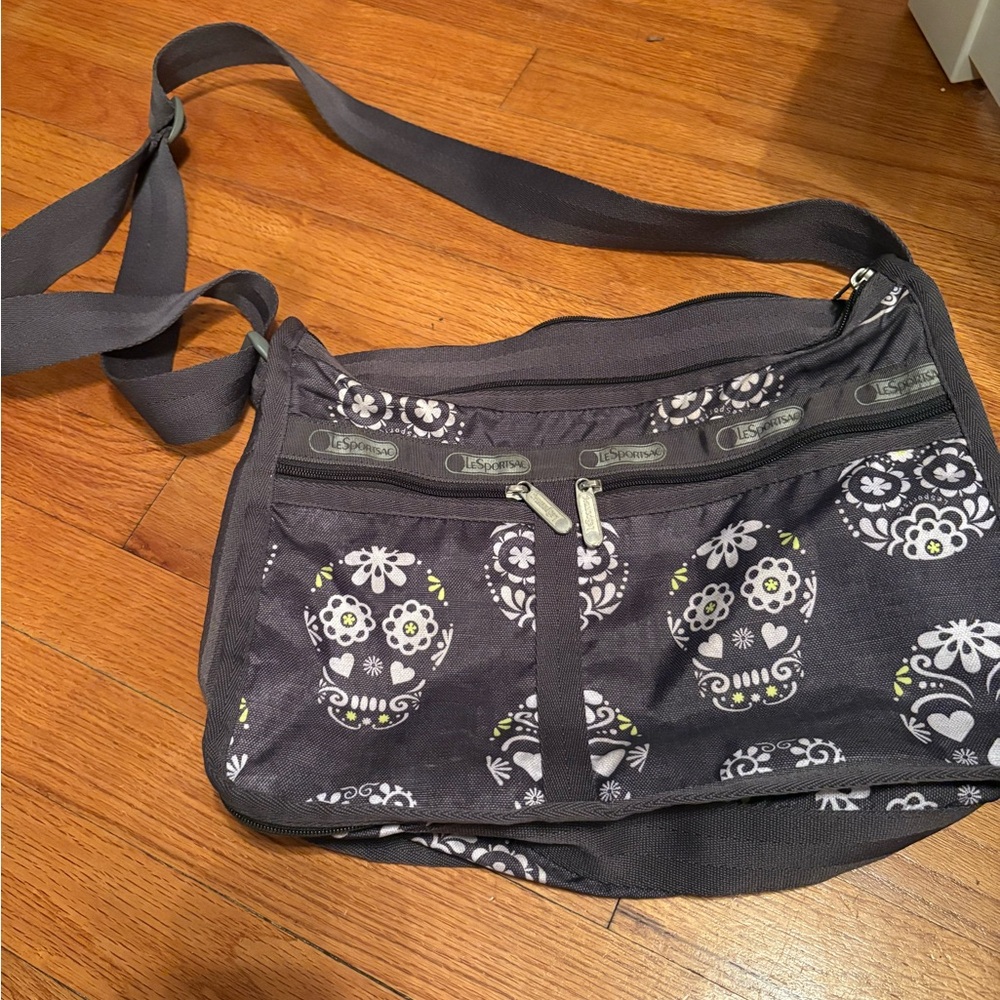 Gray LeSportsac Crossbody Bag with Sugar Skull Design